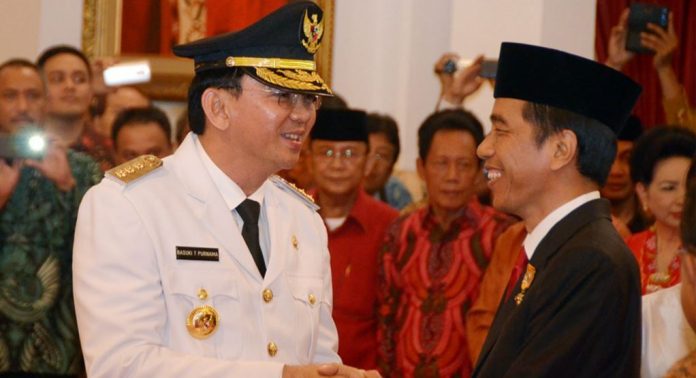 Pendukung Ahok bisa beralih dari Jokowi karena menggandeng Ma'ruf Amin. (Foto: VOA)